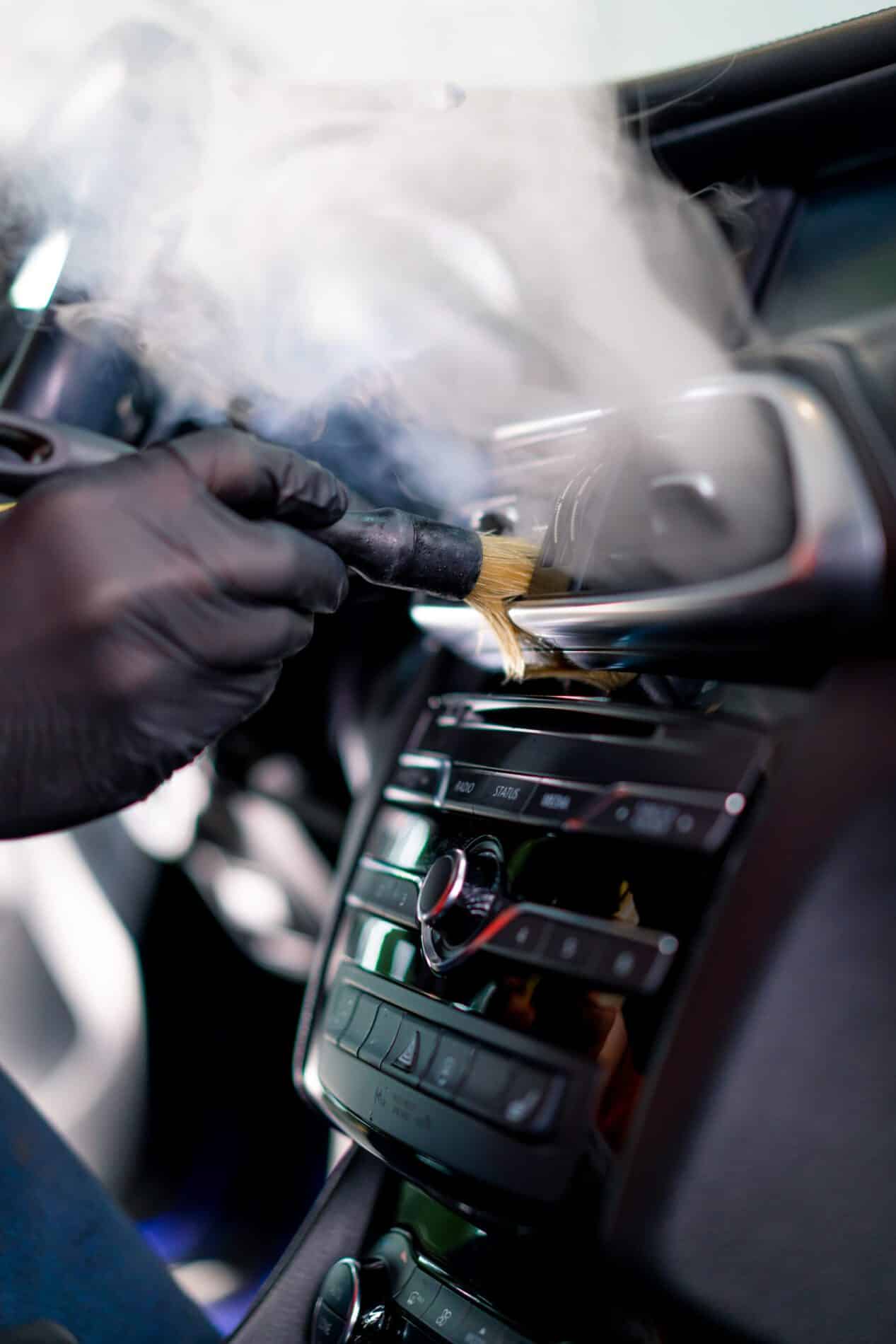 a car wash worker carefully cleans the interior of 2024 12 02 03 23 32 utc scaled