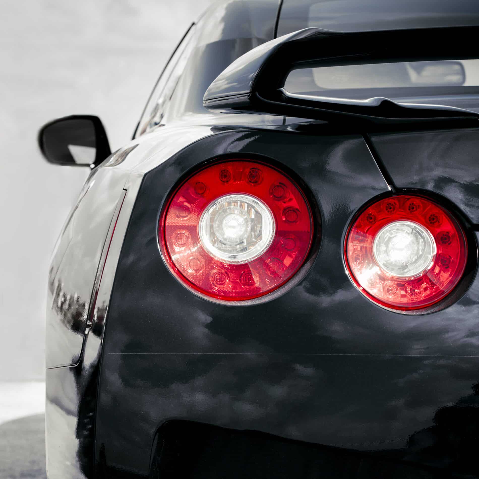 backlight of black sport car 2024 10 18 17 00 09 utc scaled
