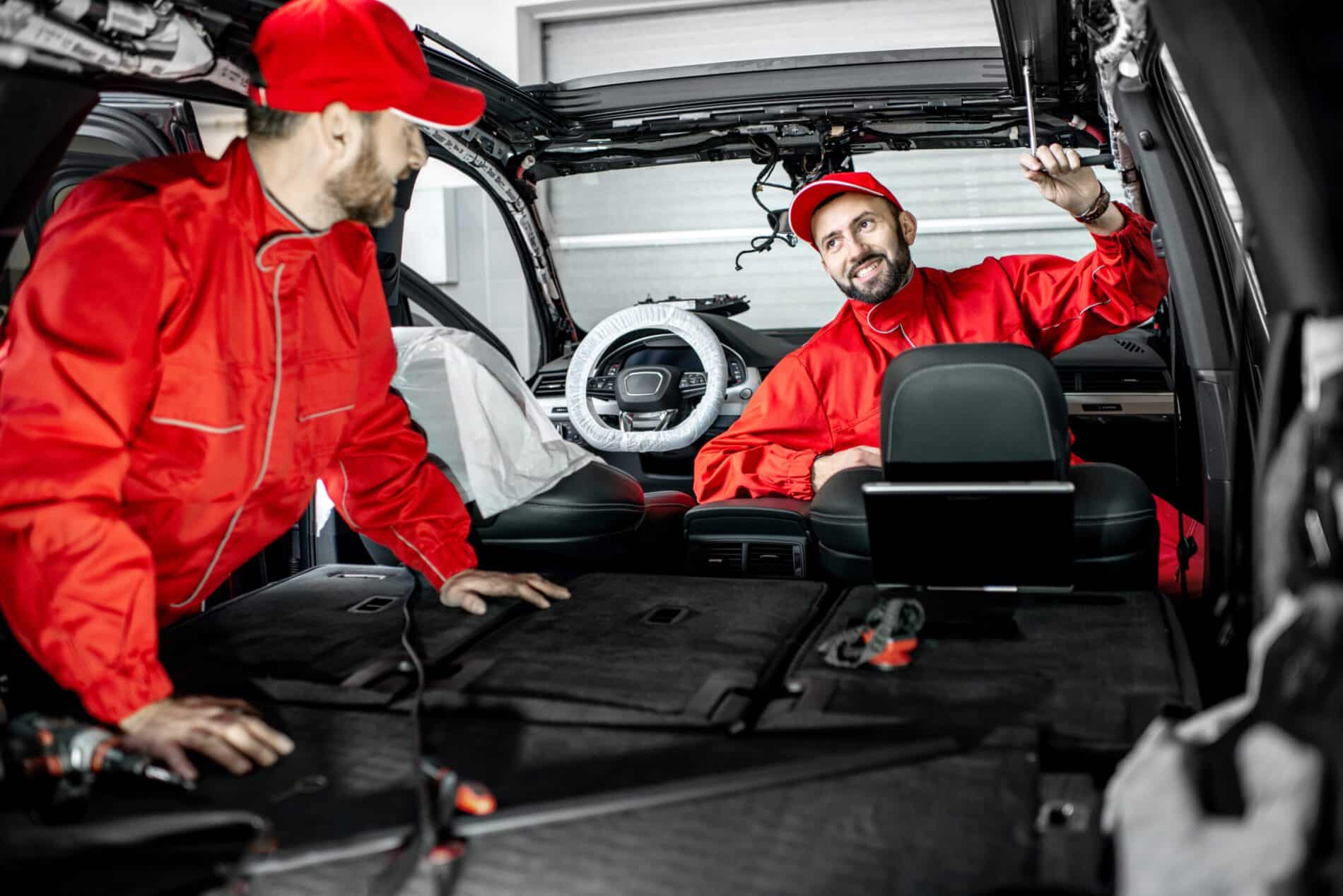 car service workers disassembling car interior 2025 03 13 03 01 52 utc scaled