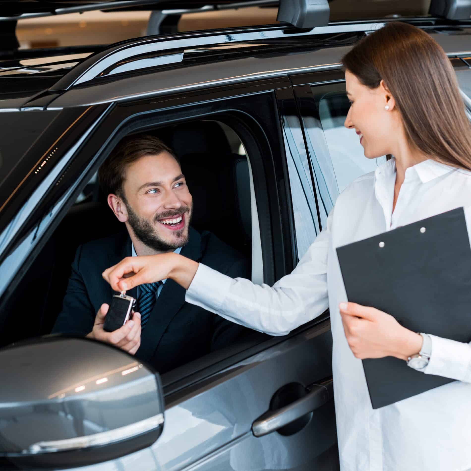 selective focus of attractive woman giving car key 2024 11 13 11 54 40 utc scaled