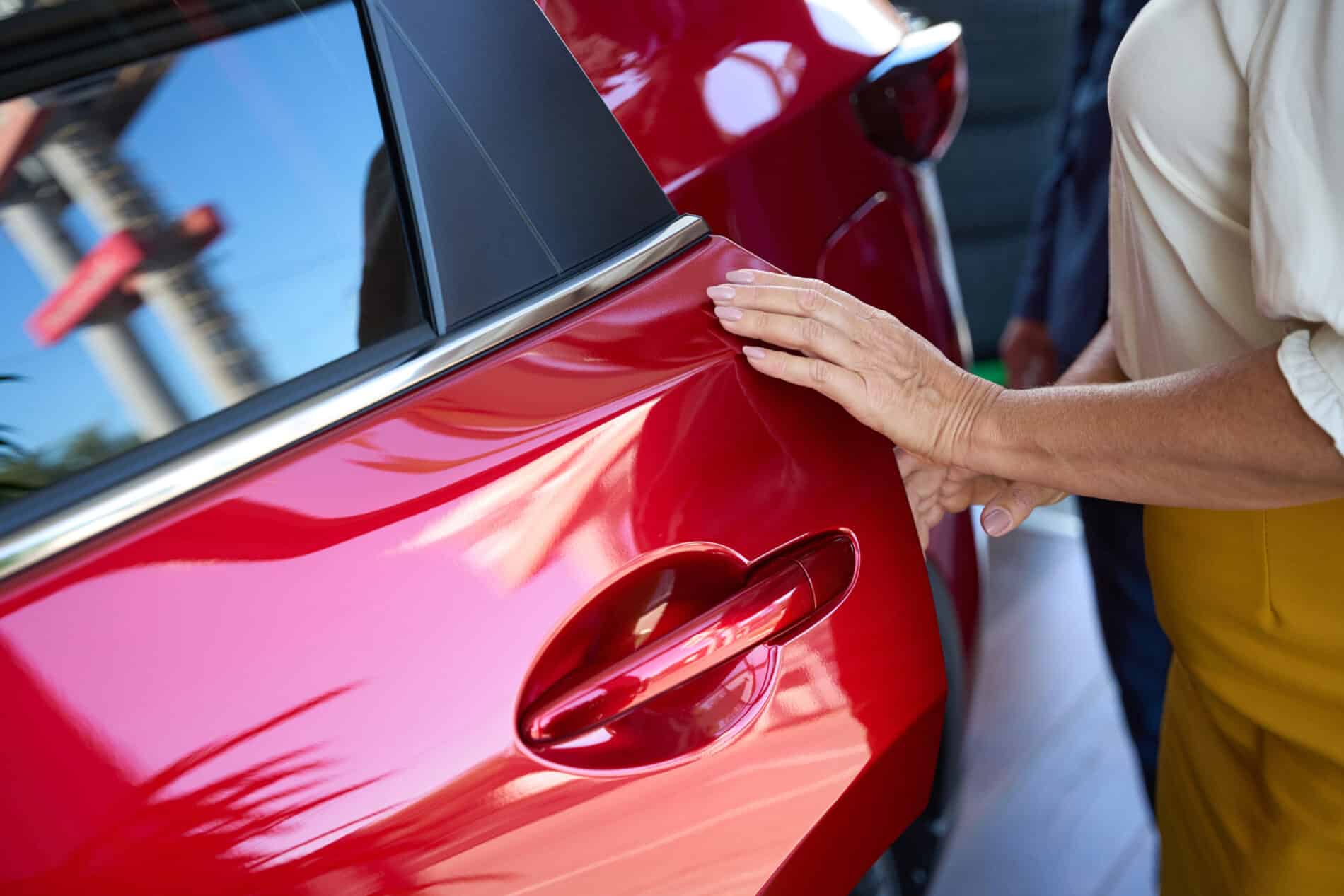 wife and husband choosing car in saloon 2024 10 21 09 20 19 utc scaled