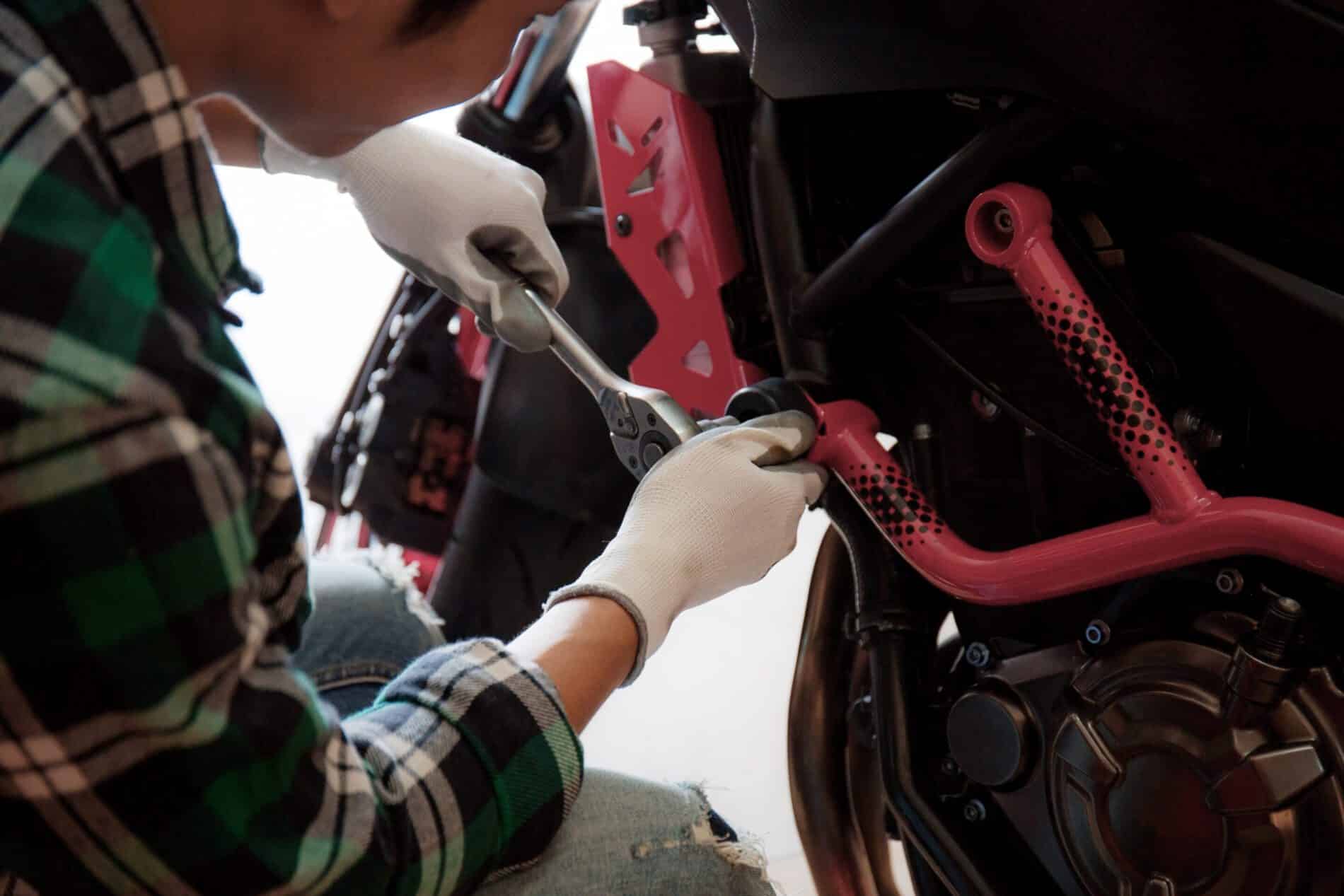 young man fixing a motorcycle 2024 10 25 00 21 11 utc scaled